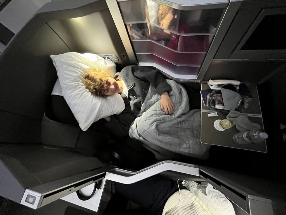 Fran taking a nap in Club World