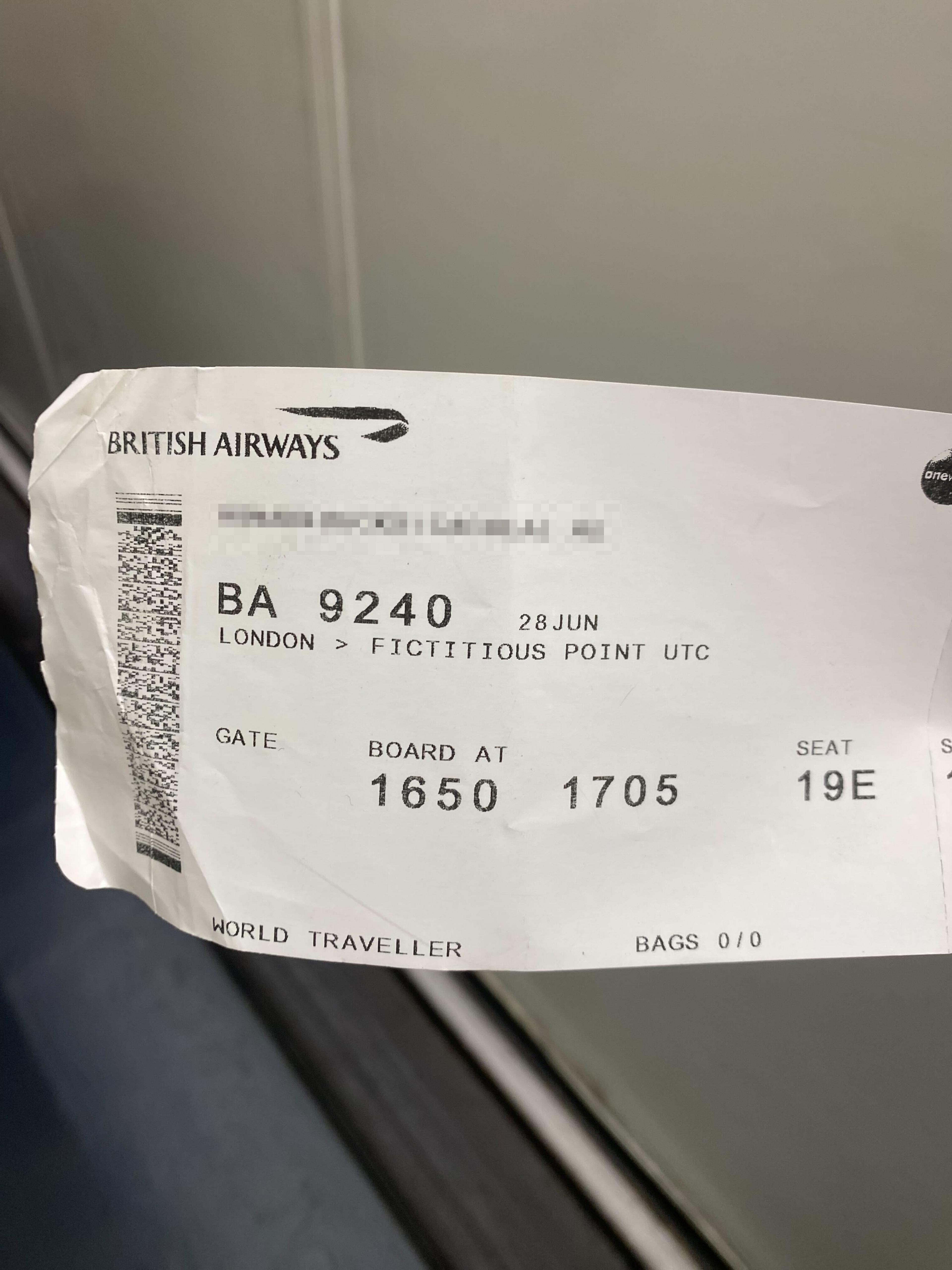 A British Airways boarding pass for a flight from London to an unspecified destination called "Fictitious Point."