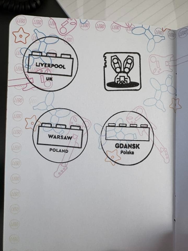 A collection of LEGO-themed stamps featuring Liverpool in the UK, and Warsaw and Gdańsk in Poland.