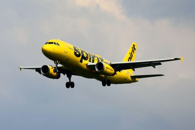 Spirit airlines cheap checked bag cost