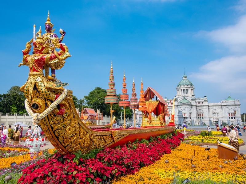 Temple in Bangkok surrounded by flowers