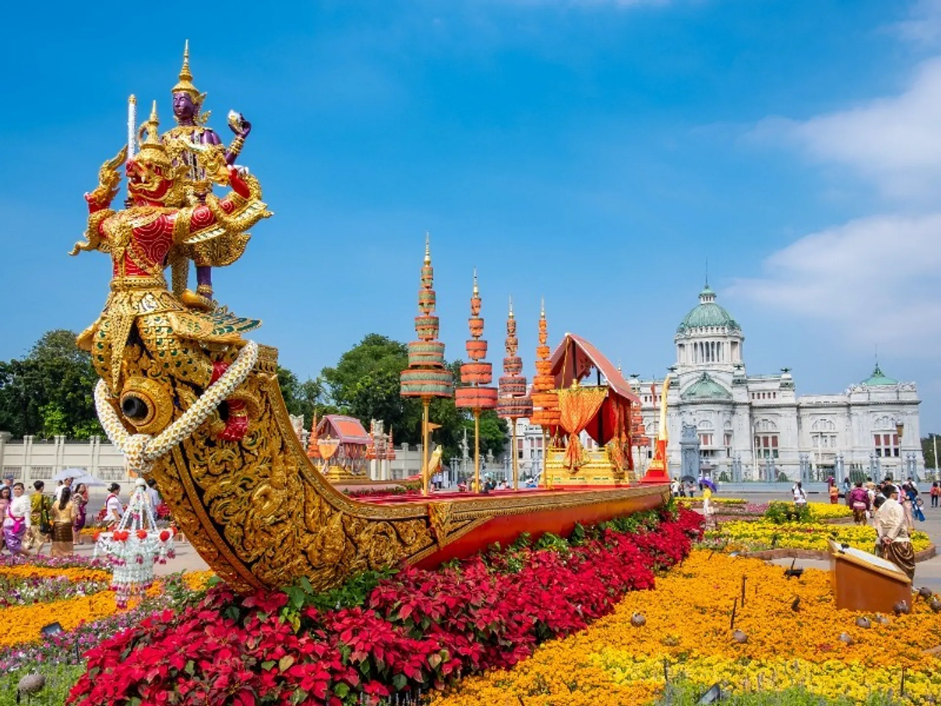 Temple in Bangkok surrounded by flowers