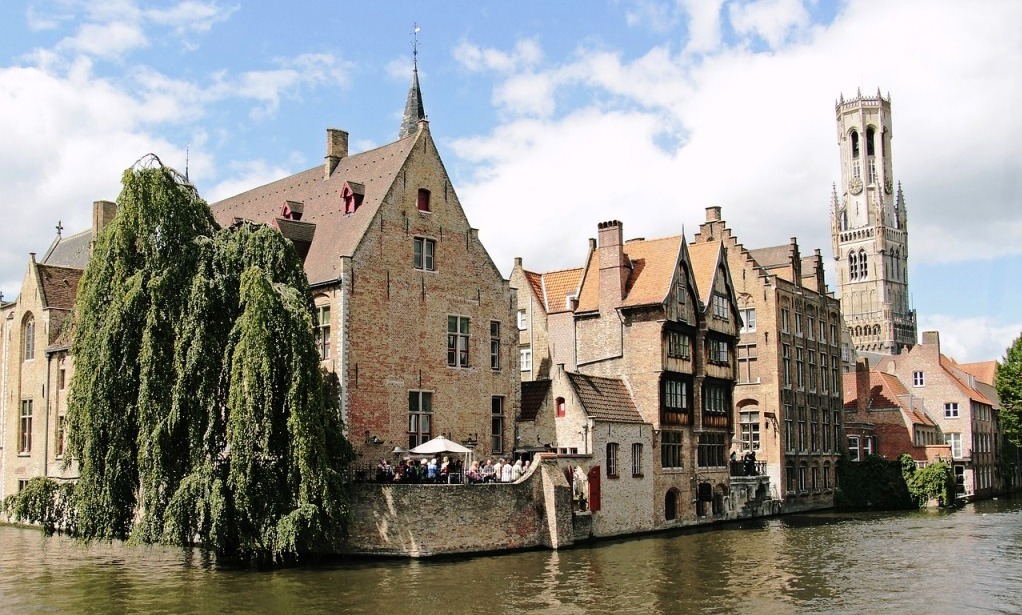 Old buildings and clocktower along a canal