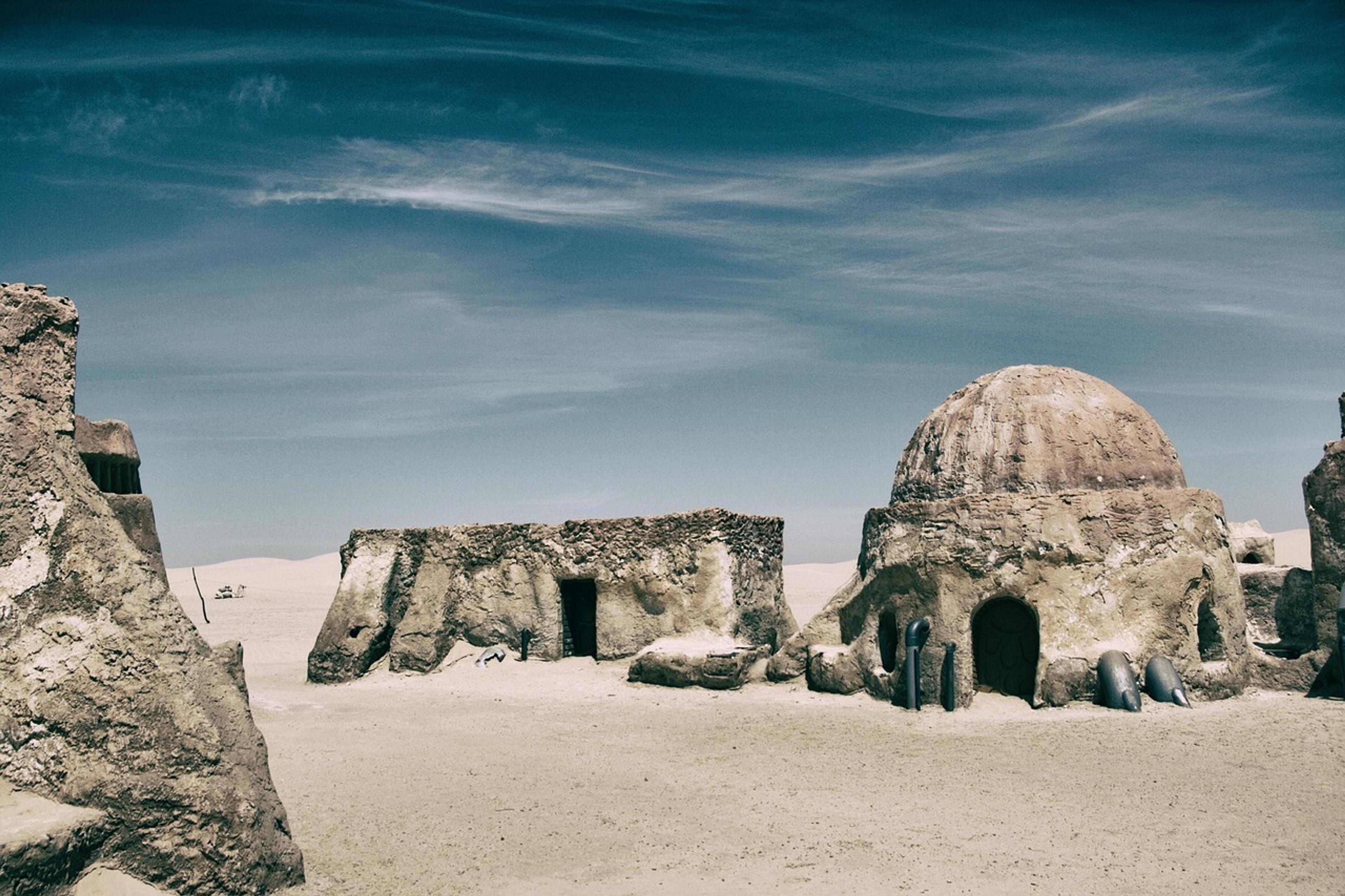Ancient-looking desert structures evoke the otherworldly scenery of the Star Wars sets in Tunisia.