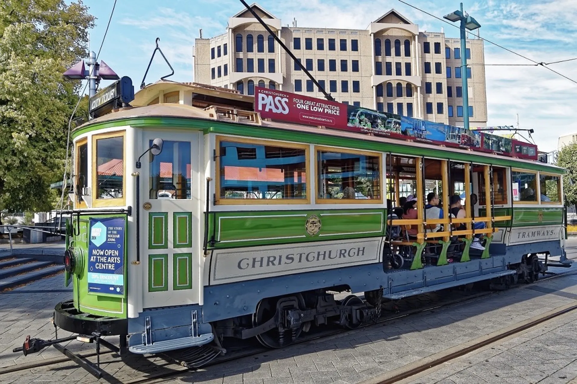 Old green tram with "Christchurch" on the side