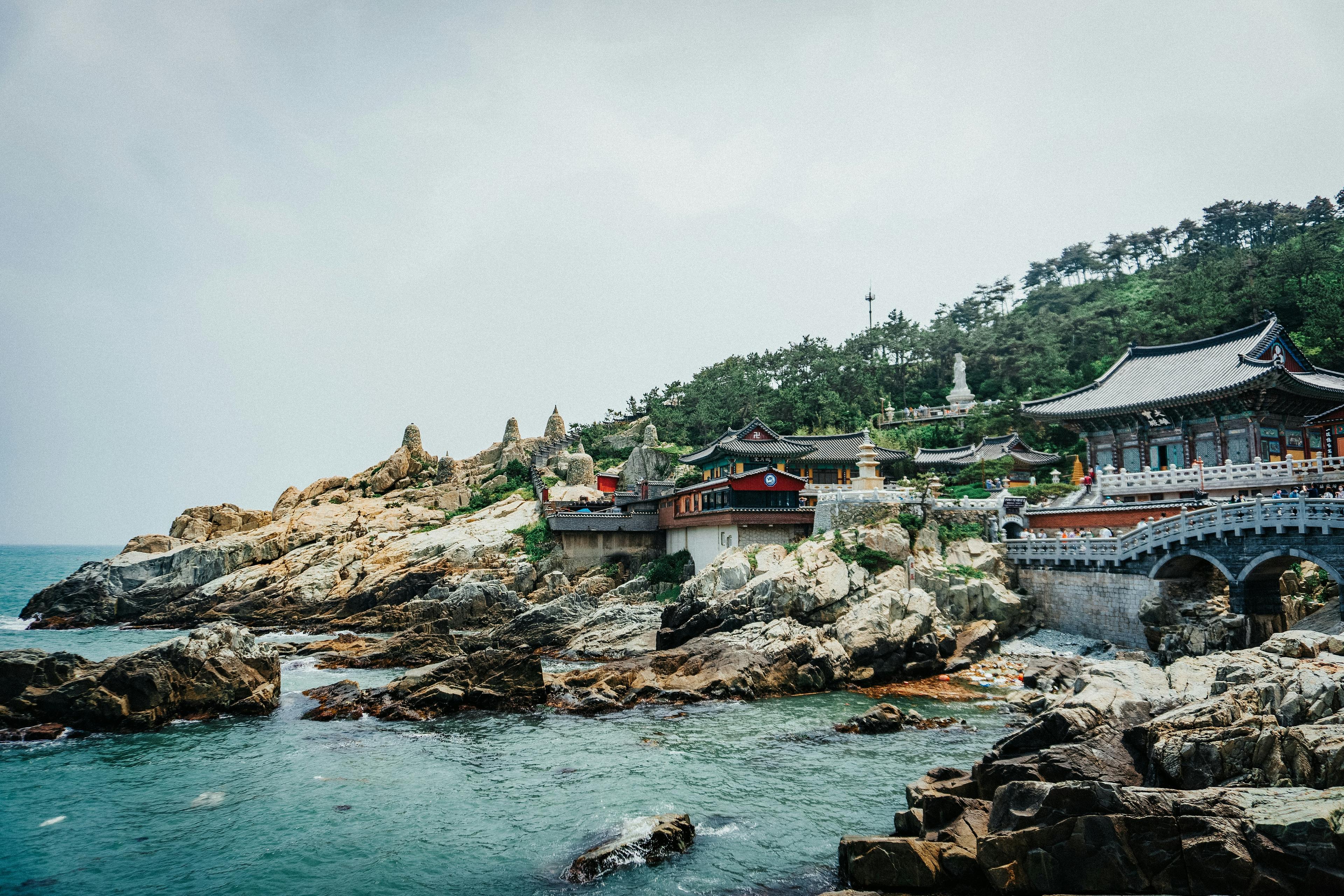 Haedong Yonggungsa Temple majestically overlooks the rocky coastline in Busan, South Korea.