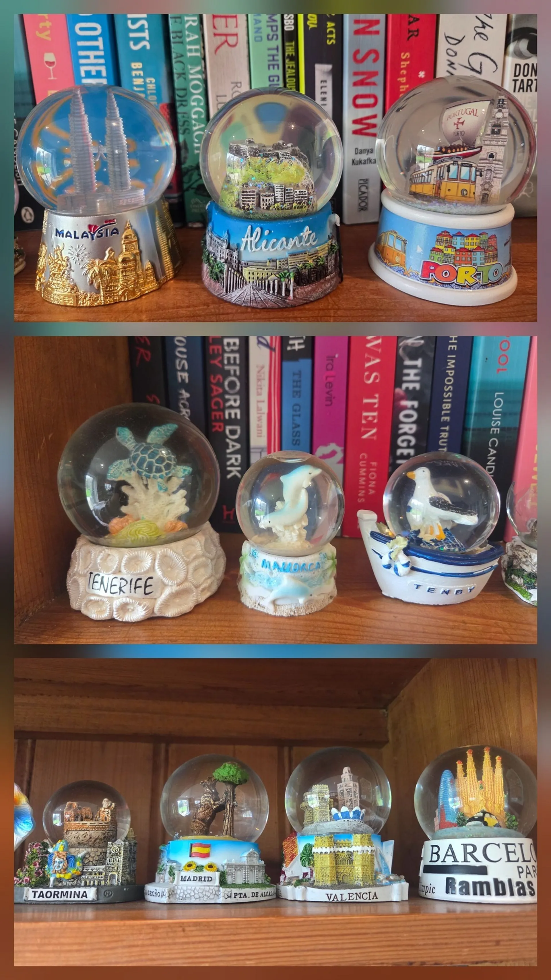 A shelf displays a vibrant collection of snow globes from various locations, including Malaysia, Alicante, Porto, Tenerife, Mallorca, Tenby, Taormina, Madrid, Valencia, and Barcelona, set against a backdrop of colorful books.