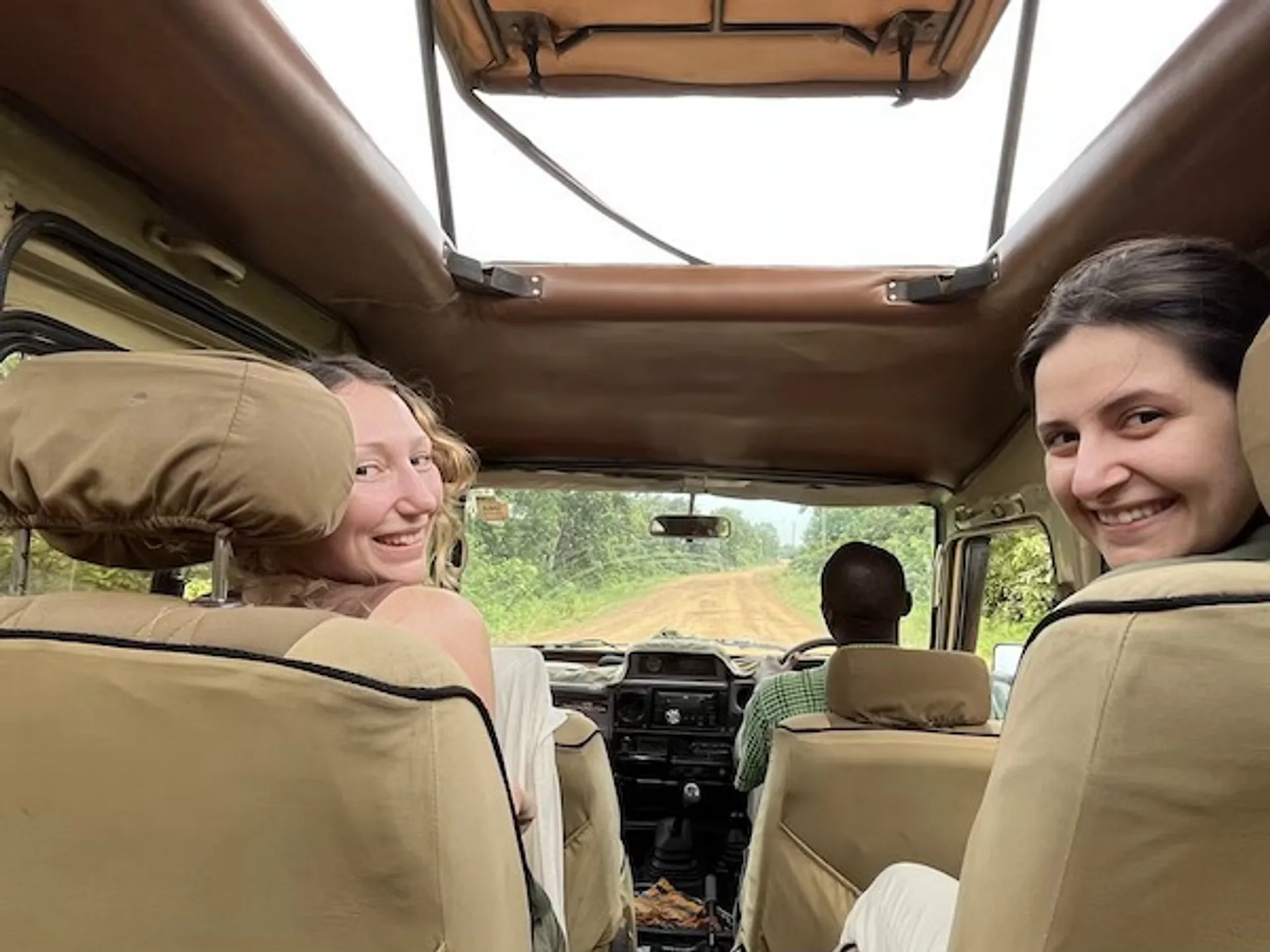 Lauren and Andreia in a jeep on a dirt track
