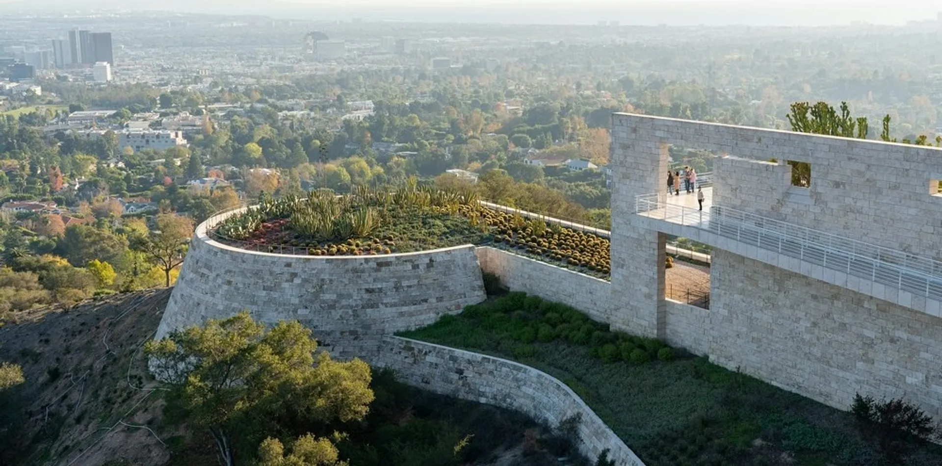 A panoramic view of the Getty Center in Los Angeles, featuring its modern architecture and surrounding gardens.