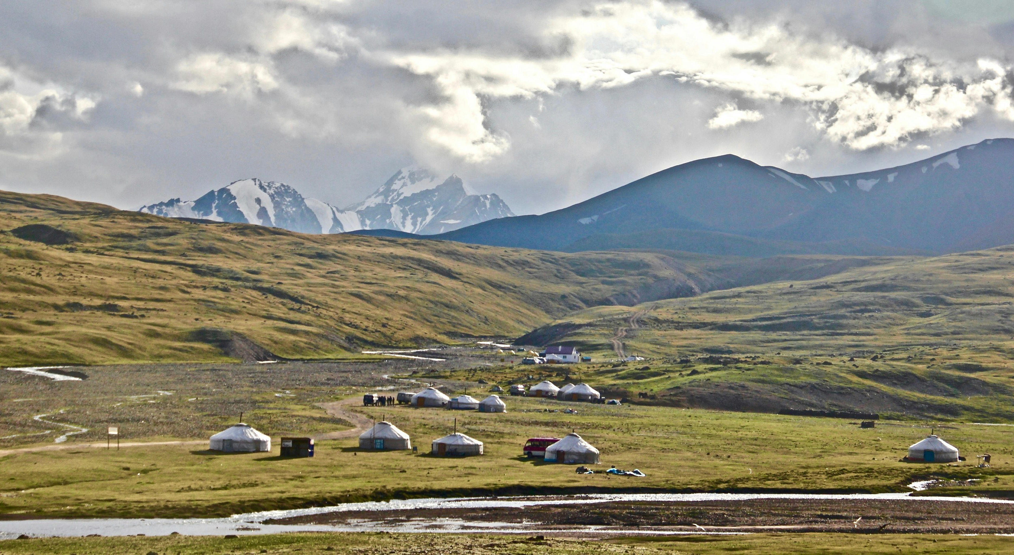 A cluster of yurts nestled in the Altai Mountains in Mongolia.