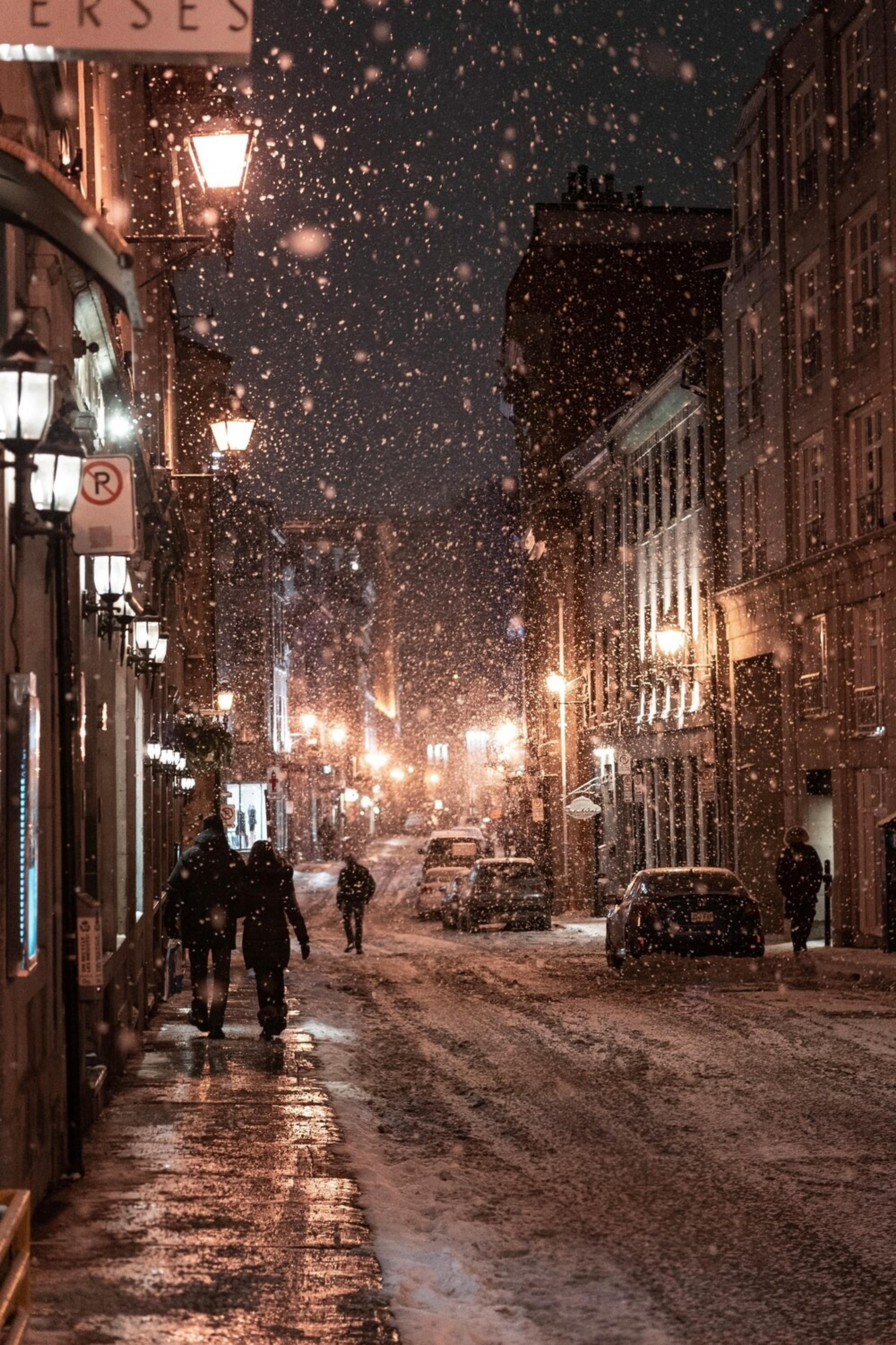 Cobblestone streets of Montreal in snow flurries.