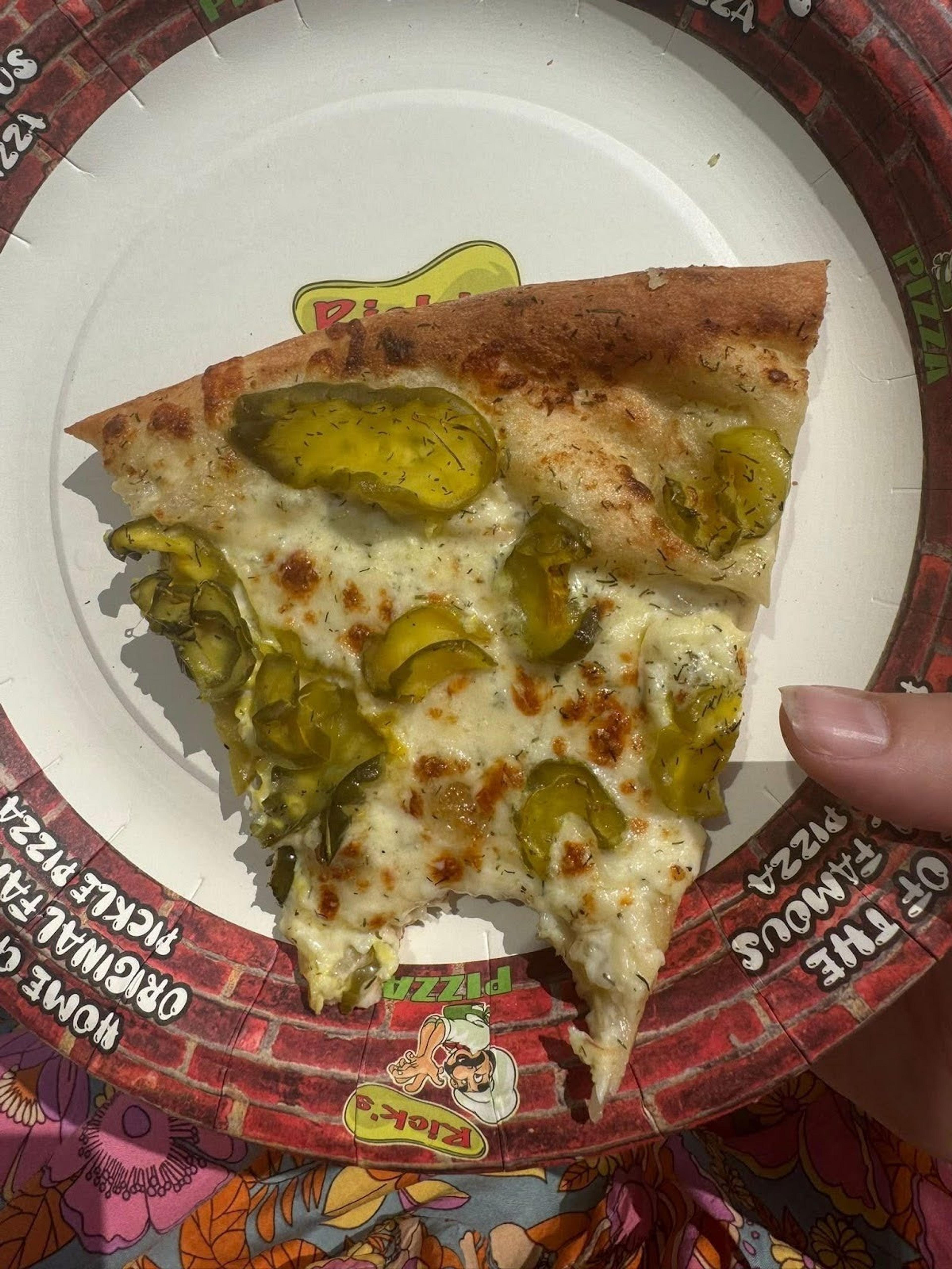 Dill pickles on a pizza